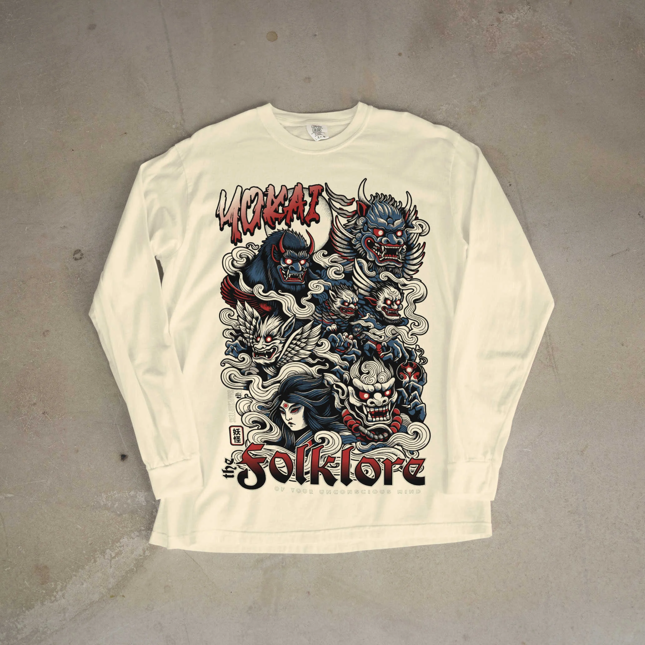 Yoruba-inspired folklore design on a white long-sleeve T-shirt, featuring traditional mythological c.